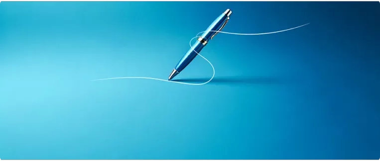 Ein Stift vor einem blauen Hintergrund mit Farbverlauf