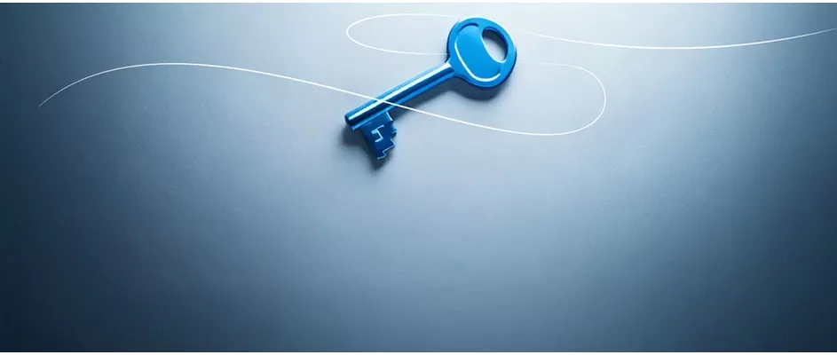 Ein Schlüssel auf blauem Hintergrund mit Farbverlauf
